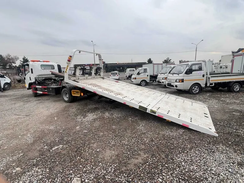 ISUZU ELF KV100 Эвакуатор — фото 3