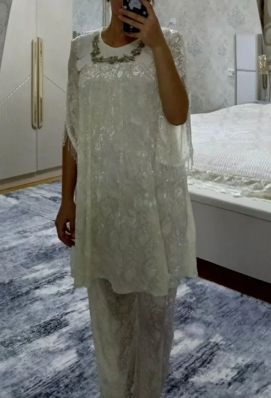 Kelinchalar uchun oq rangli nafis to‘plam (ko‘ylak va ishton) Kelinchalar uchun oq rangli nafis to‘plam (ko‘ylak va ishton)