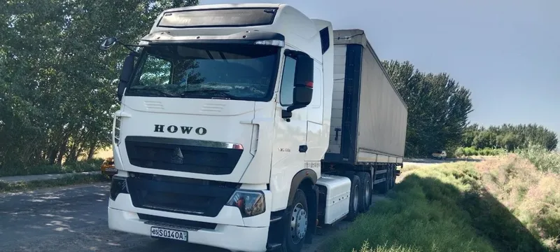 HOWO T7 + UzAutoTRAILER прицеп Сотилади 6 HOWO T7 + UzAutoTRAILER прицеп Сотилади 6