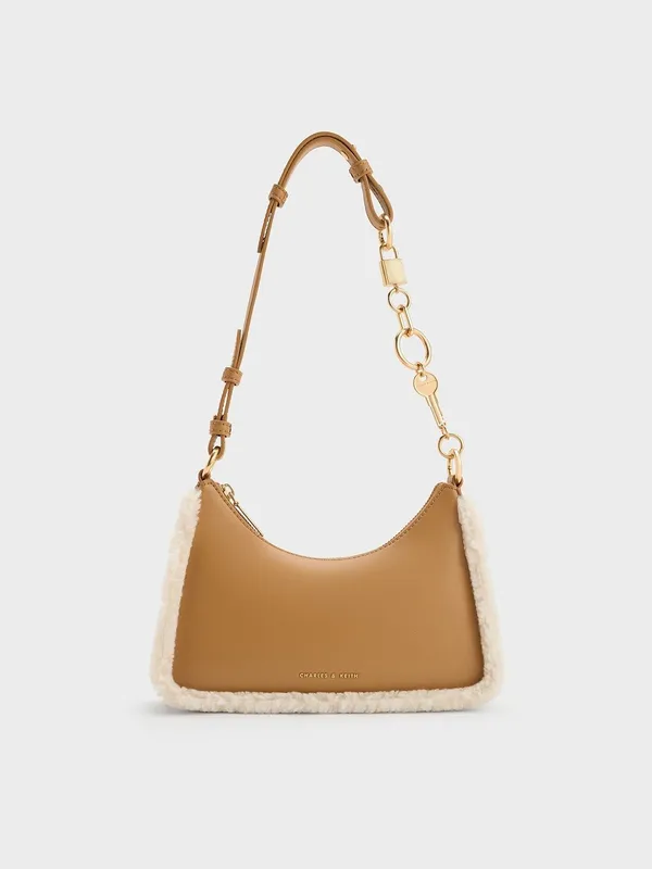 Сумка от бренда Charles & Keith
