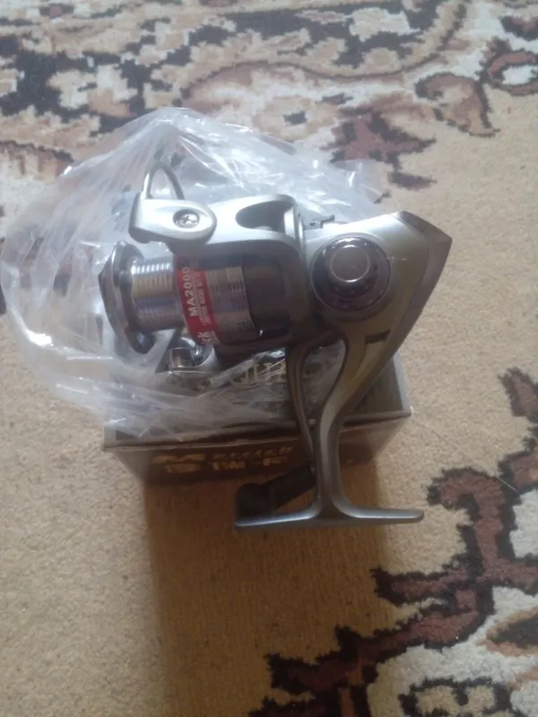 Катушка для рыбалка 1 Катушка для рыбалка 1