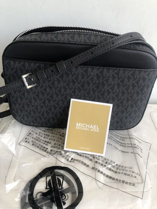 Фирменая сумочка от michael kors — фото 3
