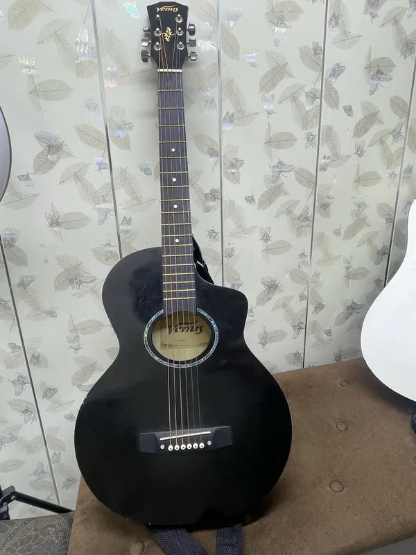 Akkustik gitara sotiladi holati yaxshi 1 Akkustik gitara sotiladi holati yaxshi 1