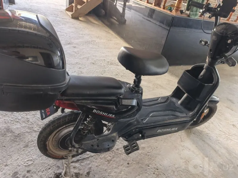 Sukuter elektronik bir zaryad bilan 60 km 2 Sukuter elektronik bir zaryad bilan 60 km 2