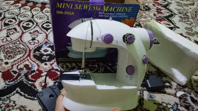 мини швейная машинка 1 мини швейная машинка 1