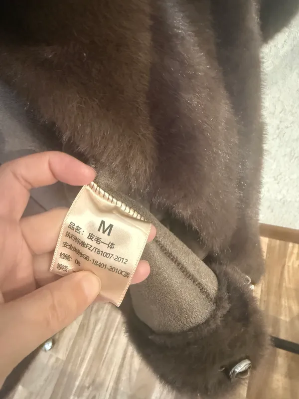 Ayollar ustki kiyimi