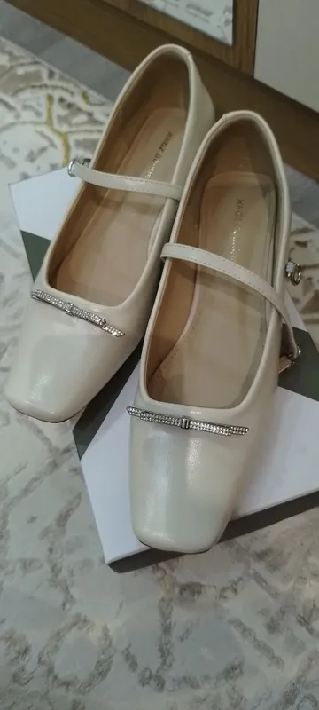 Nafis krem rangli ayollar tuflisi – Elegant va qulay 2 Nafis krem rangli ayollar tuflisi – Elegant va qulay 2