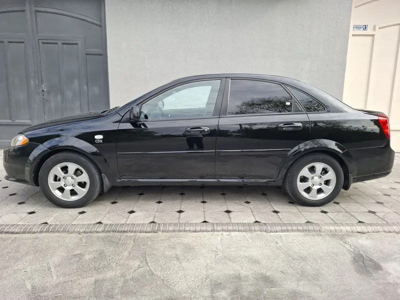 Chevrolet Lacetti qora 2019 yil 160.000 km masofa bosgan holati yahshi — фото 3 Chevrolet Lacetti qora 2019 yil 160.000 km masofa bosgan holati yahshi — фото 3