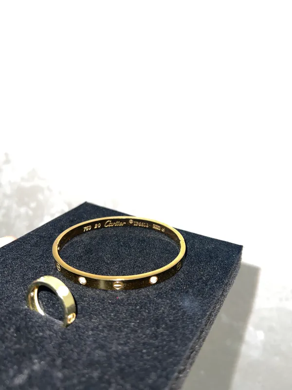 Cartier braslet va uzuk