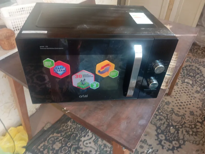 Продается Новая микроволновка artel 1