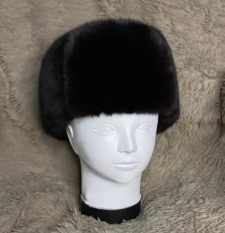 Женская шапка обманка