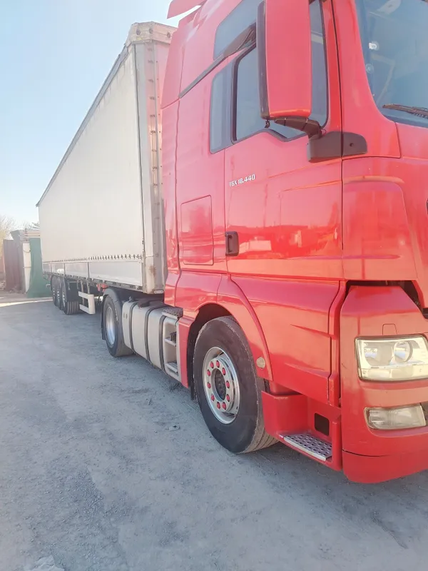 Продаётся MAN tgx 440 standart 2010 года. прицеп Kassbohrer 2012 года — фото 1