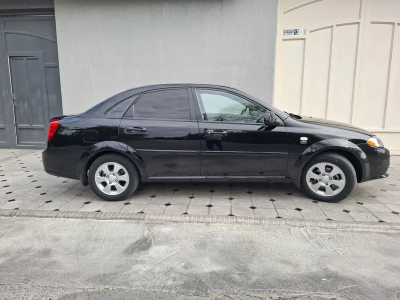 Chevrolet Lacetti qora 2019 yil 160.000 km masofa bosgan holati yahshi — фото 2 Chevrolet Lacetti qora 2019 yil 160.000 km masofa bosgan holati yahshi — фото 2