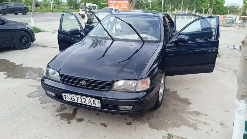 Toyota carina e 1996 yil — фото 2