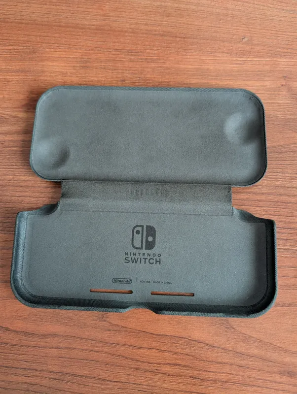 Nintendo switch lite цвет коралловый 3