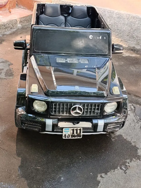 Этот детский электромобиль лицензионная модель Mercedes-Benz G- Cla 1 Этот детский электромобиль лицензионная модель Mercedes-Benz G- Cla 1