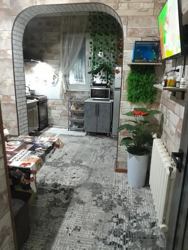 Mirobod tumani Qoyliq massiv 4 da 2 xona 4 etaj uy — фото 1