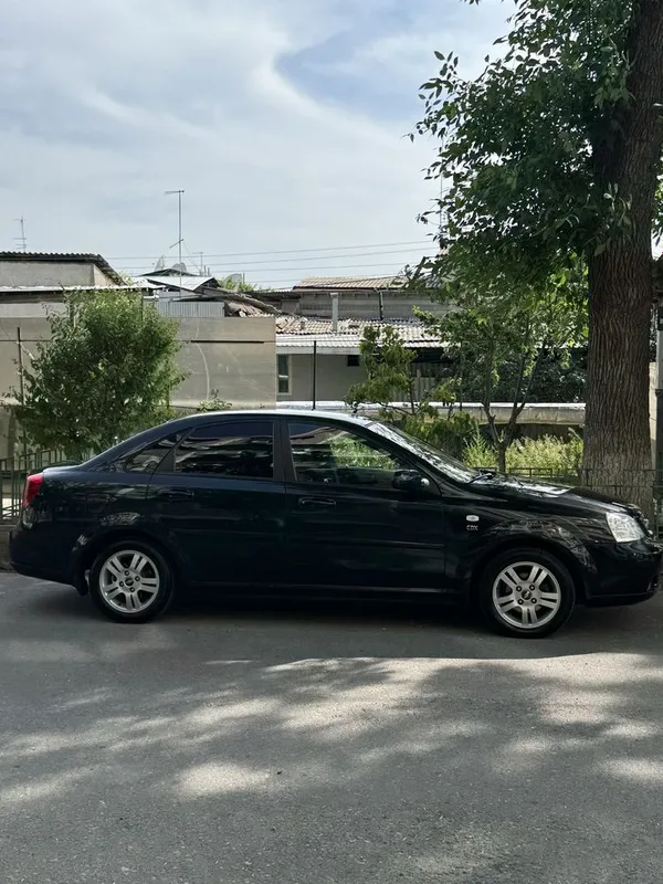 lasetti 1.8 2013 йил 4