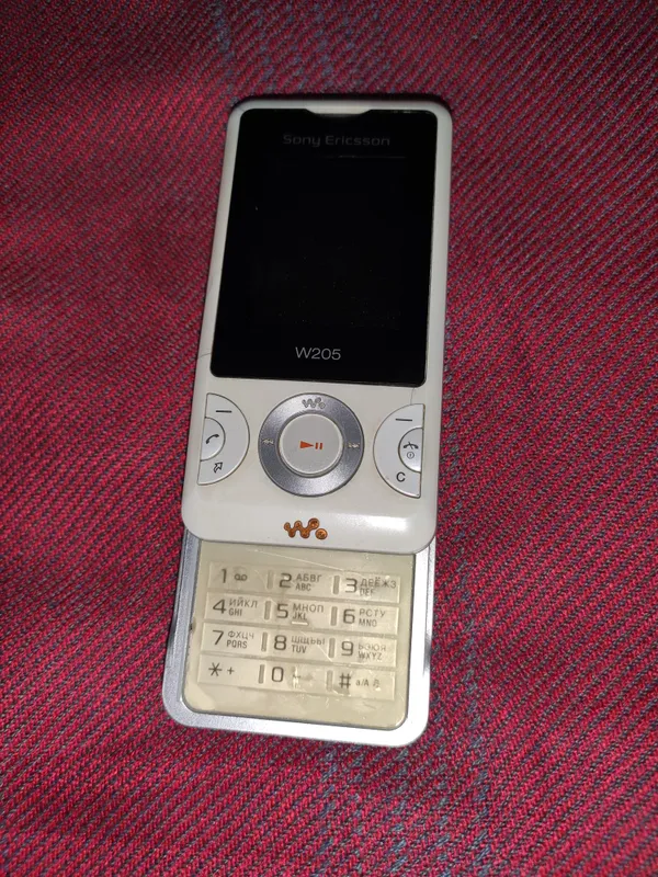 Sony Ericsson W205 Walkman Oriflame × Дима Билан 3