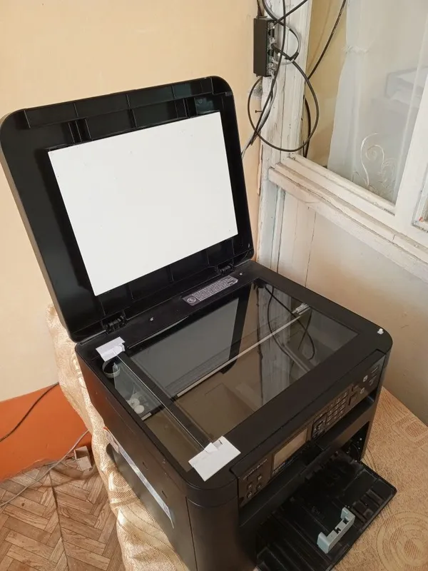 Canon MF211 oq qora 3tasi 1da printer — фото 2