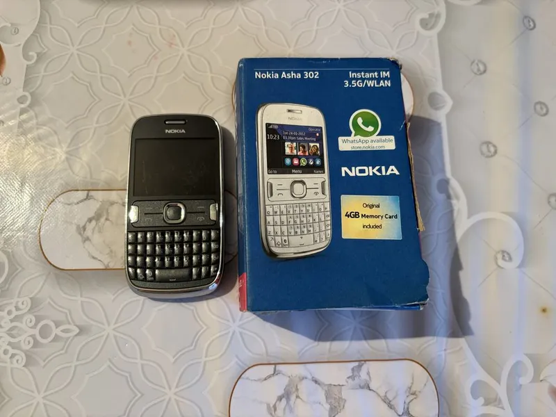 Продам Nokia 302
