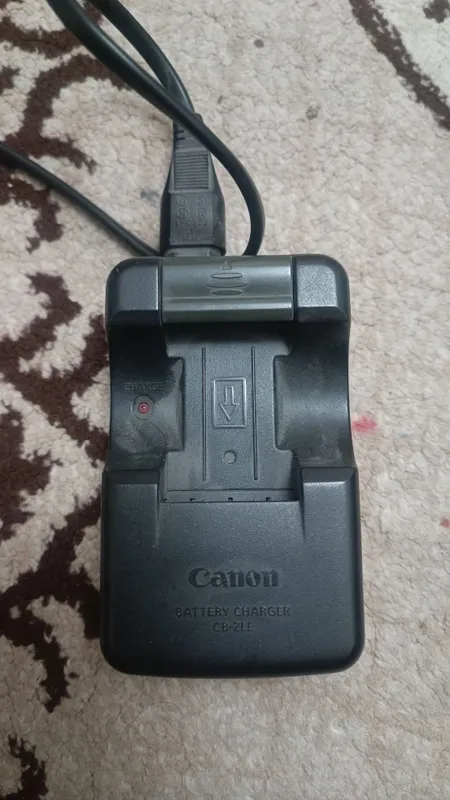 оригинальное зарядное устройство Canon CB-2LE. оригинальное зарядное устройство Canon CB-2LE.