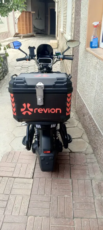 Скутер Ревион 2026 5
