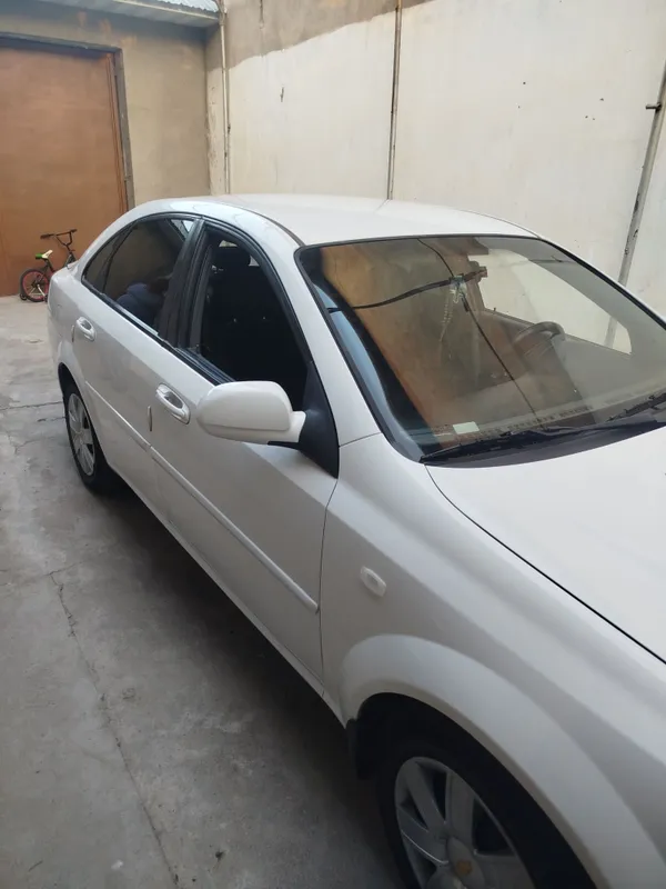 lacetti 1.8 2011 г. 5