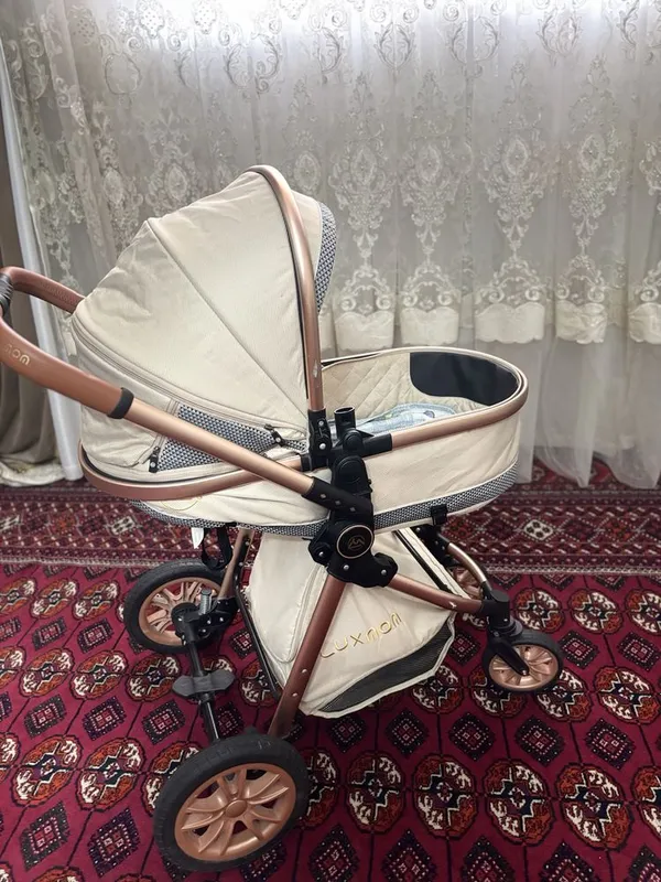 Kolyaska luxmom sotiladi uy ichida haydalgan faqat 2 Kolyaska luxmom sotiladi uy ichida haydalgan faqat 2