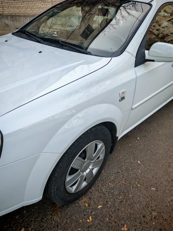 Lacetti 1.6 3-позиция 2013 год. Белая. В отличном состоянии — фото 3