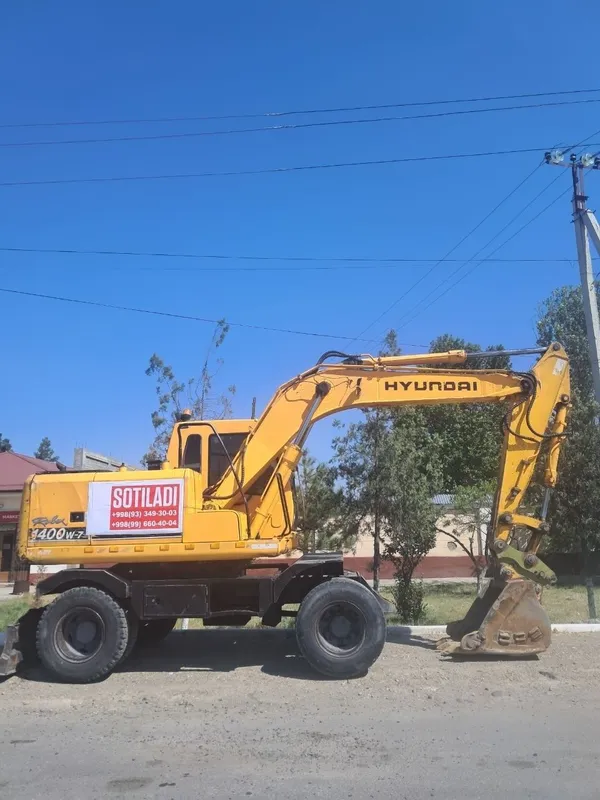 Hyundai Robex 1400W-7 g‘ildirakli ekskavatori. 3 Hyundai Robex 1400W-7 g‘ildirakli ekskavatori. 3