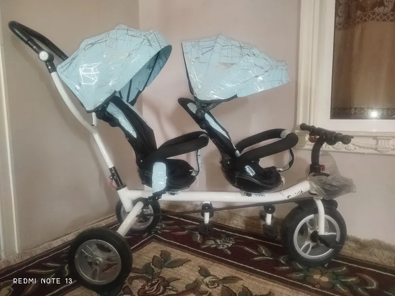 Bolalar velolosiped kolyaskasi