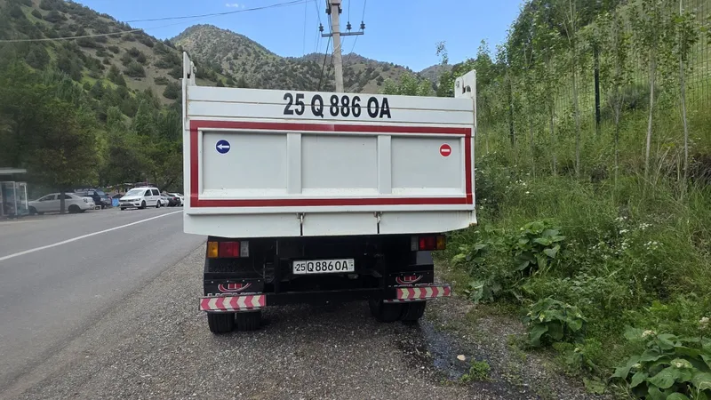 Автомобиль ISUZU — фото 4