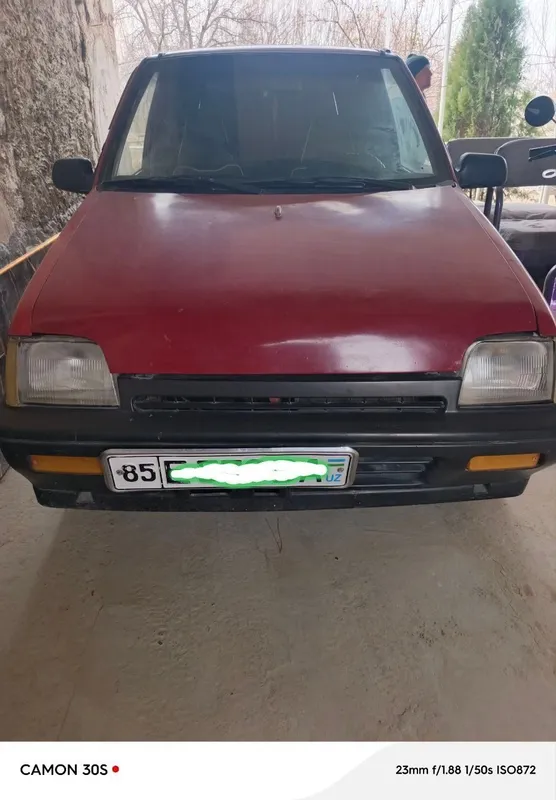 Daewoo Tico qizil