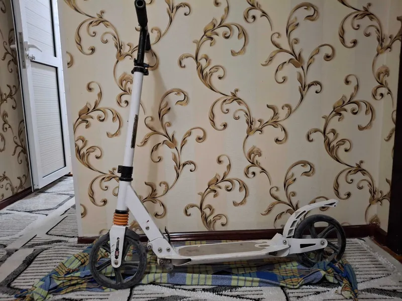 Детский самокат.