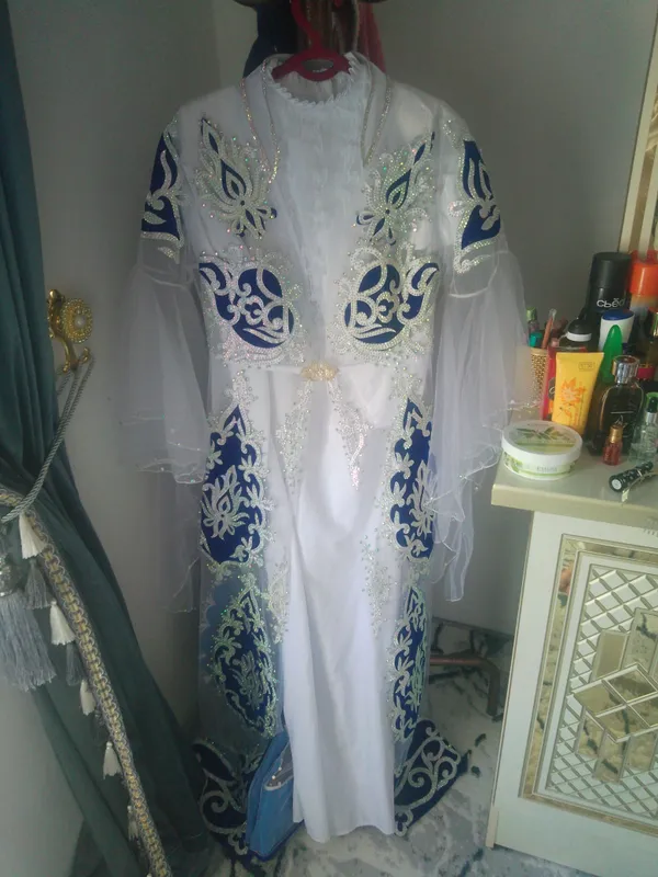 ansambil doʻppichasi bilan birga
