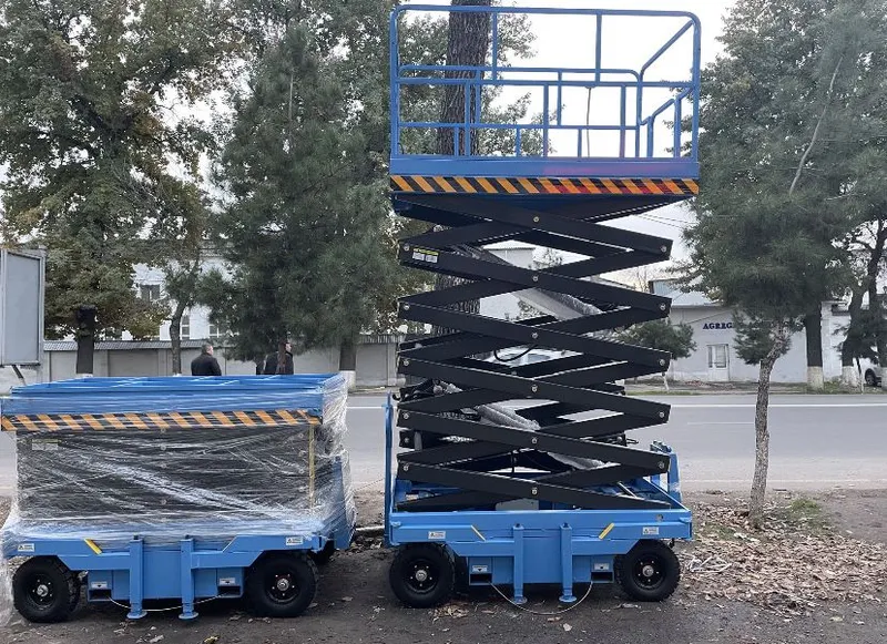 Передвижной ножничный подъемник