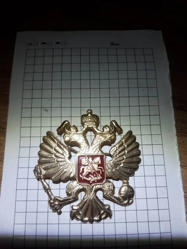 Кокарда Российская.