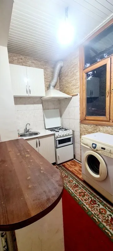 Ялангач Кв-3ком ( кафе Бухора) Академ. Мирзо улугбекский 1