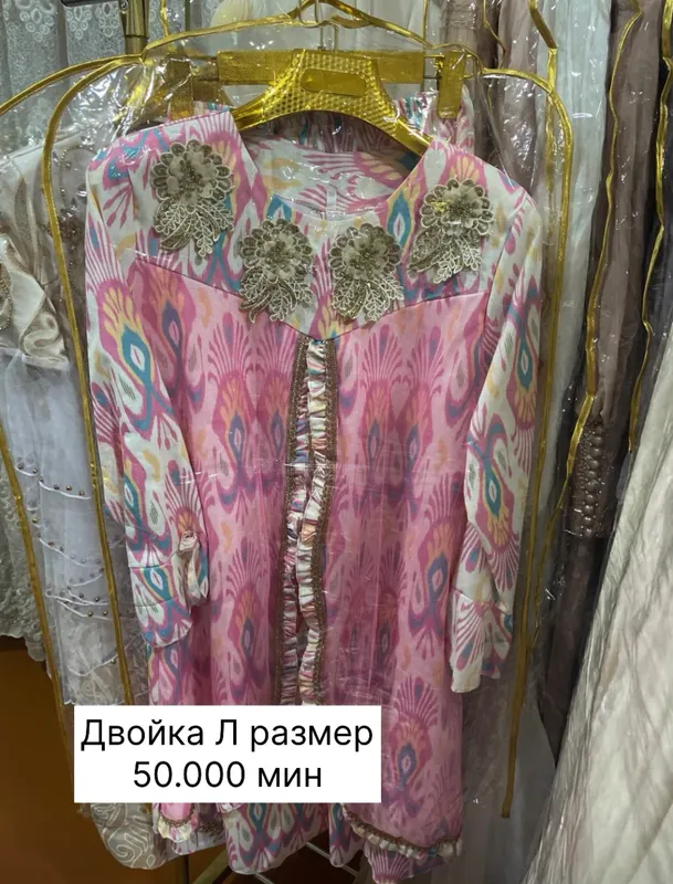 Двойка келинлага йенги кийлмаган