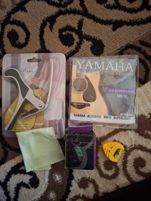GITARA SATILADI MANZIL XOJELI