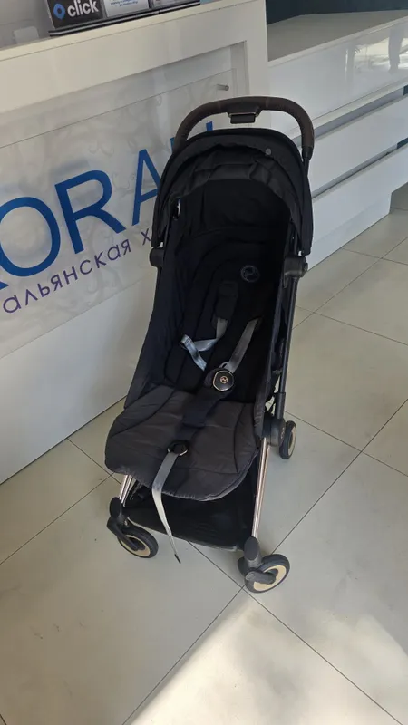 Cybex Coya Platinum с коричневой кожей , чёрный с золотом цвет б.у. 5