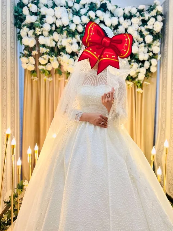 kelin ko'ylak kiyilgan