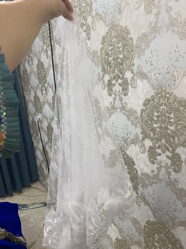 Kelin sari profilda bunga mos dòppi ham bor