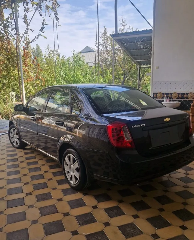 Lacetti 1.8 qora 6