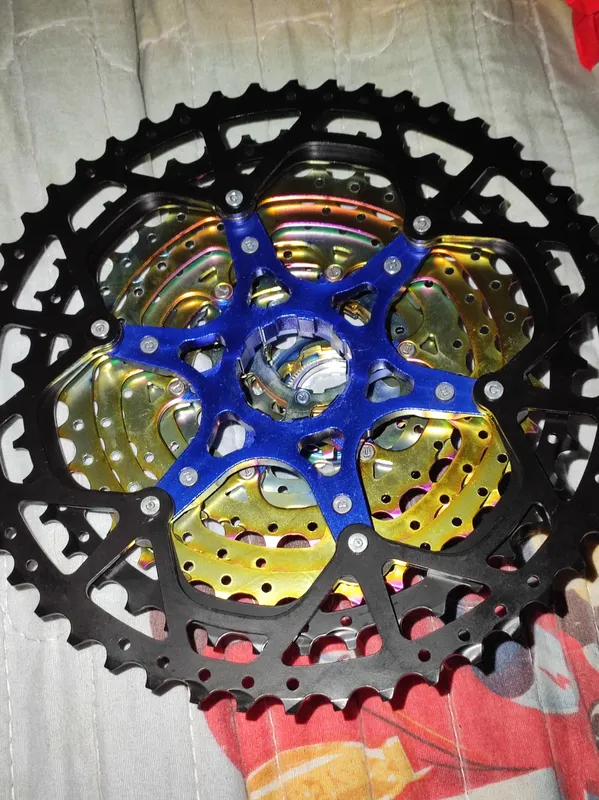 Velosiped kassetasi 11/50 HG Shimano oil slick 3 Velosiped kassetasi 11/50 HG Shimano oil slick 3