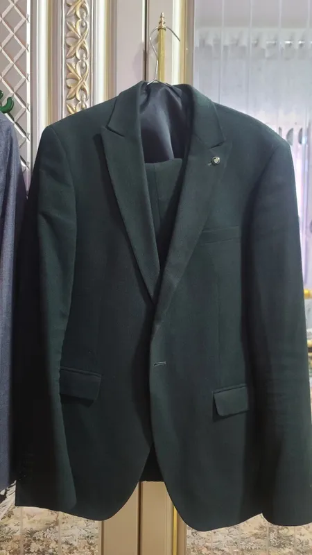 Kastyum shim 2tasi 500ming razmer 48 troyka deyarli yangi 1 Kastyum shim 2tasi 500ming razmer 48 troyka deyarli yangi 1