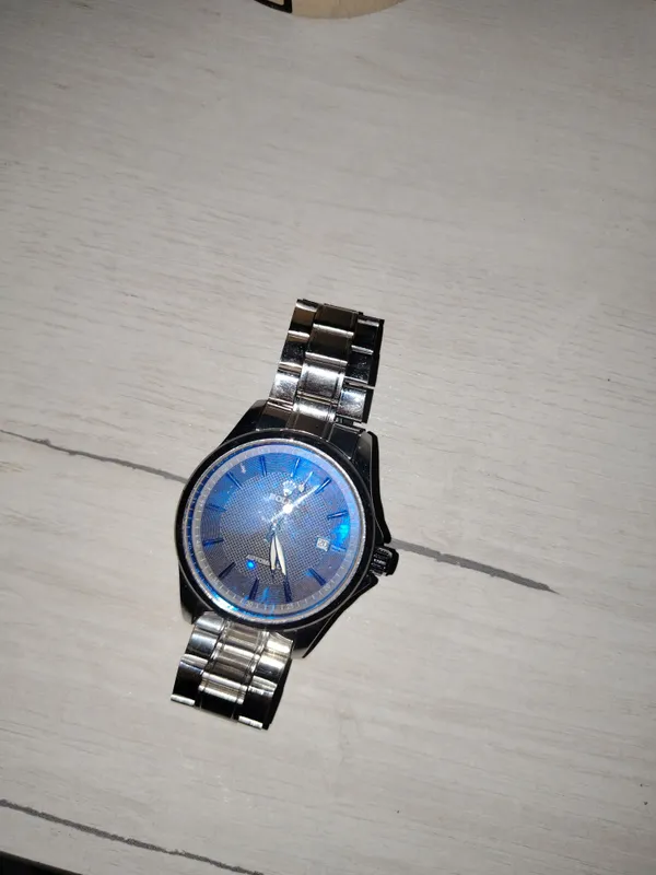 Часы с надписью Rolex