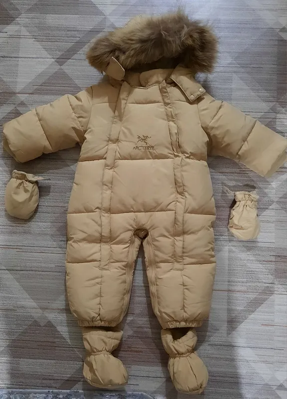 Продам новый зимний комбинезон детский
