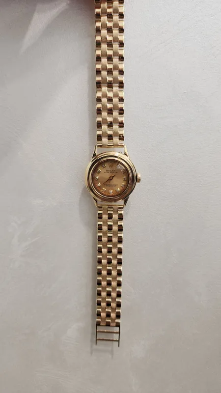 Женские золотые часы Rolex — фото 5
